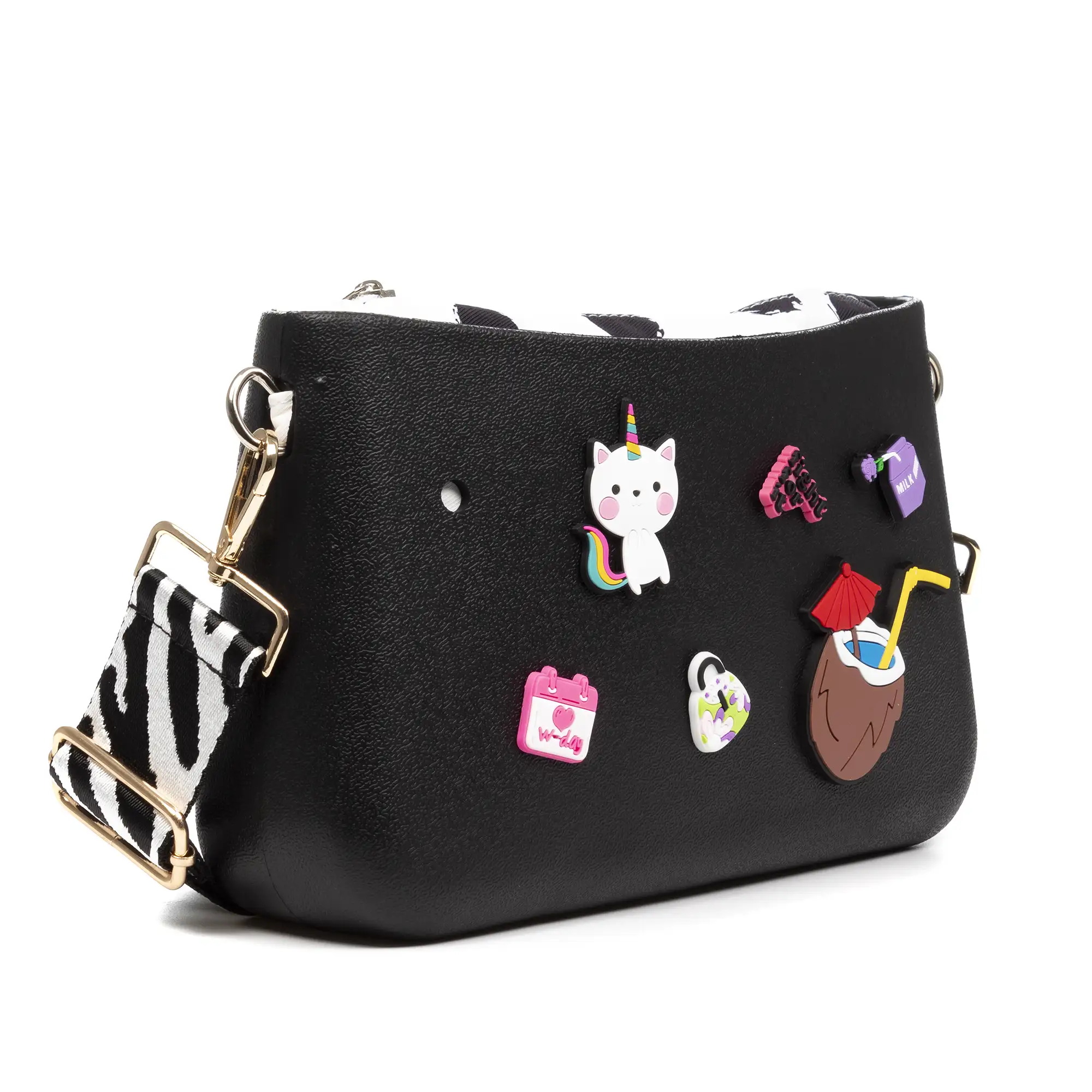 Villareggia bolso bandolera, de goma eva con correa ajustable y bolsa interior estampada. Correa y bolsa interior intercambiables.